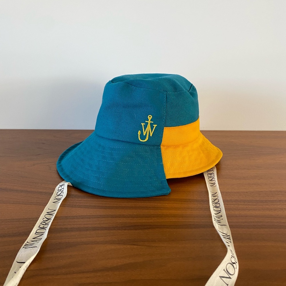JW ANDERSON TWO TONE ASYMMETRIC BUCKET HAT BLUE AND YELLOW
